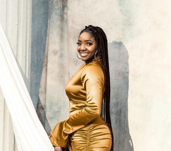 Simi reacts as Fan names his newborn child after her