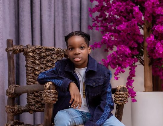 Boluwatife, Wizkid's son shows off 100 Dollar notes he got from his father.