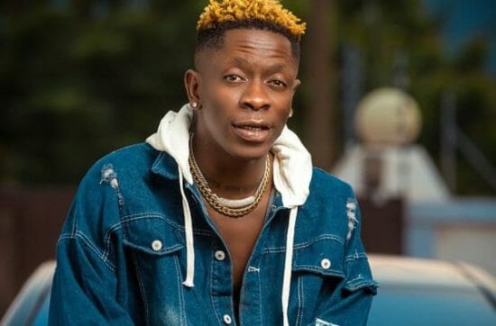 Shatta Wale responds to backlash trailing him for kissing his male bodyguard.
