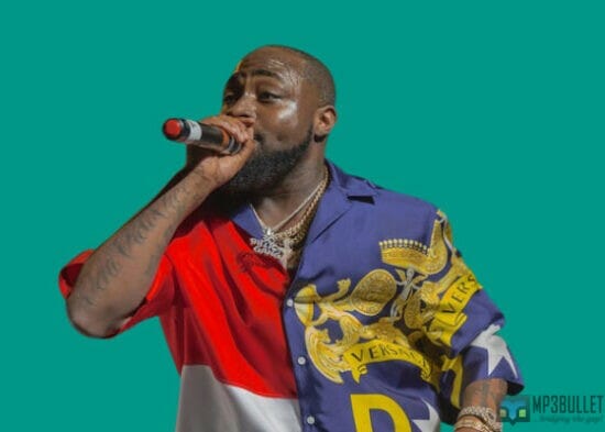 Watch the moment a female fan almost fainted after Davido passed her a mic