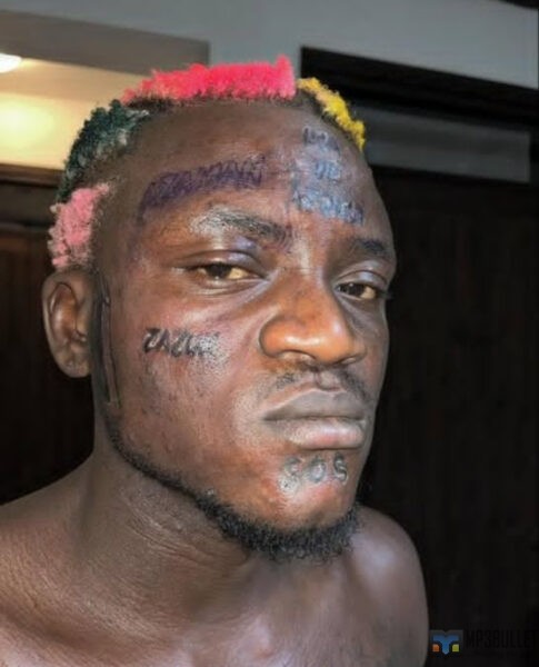 Nigerian artists with facial tattoos