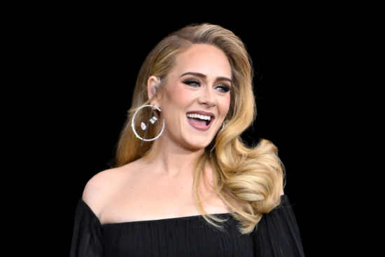 Adele sparks engagement rumours as singer flashes impressive ring